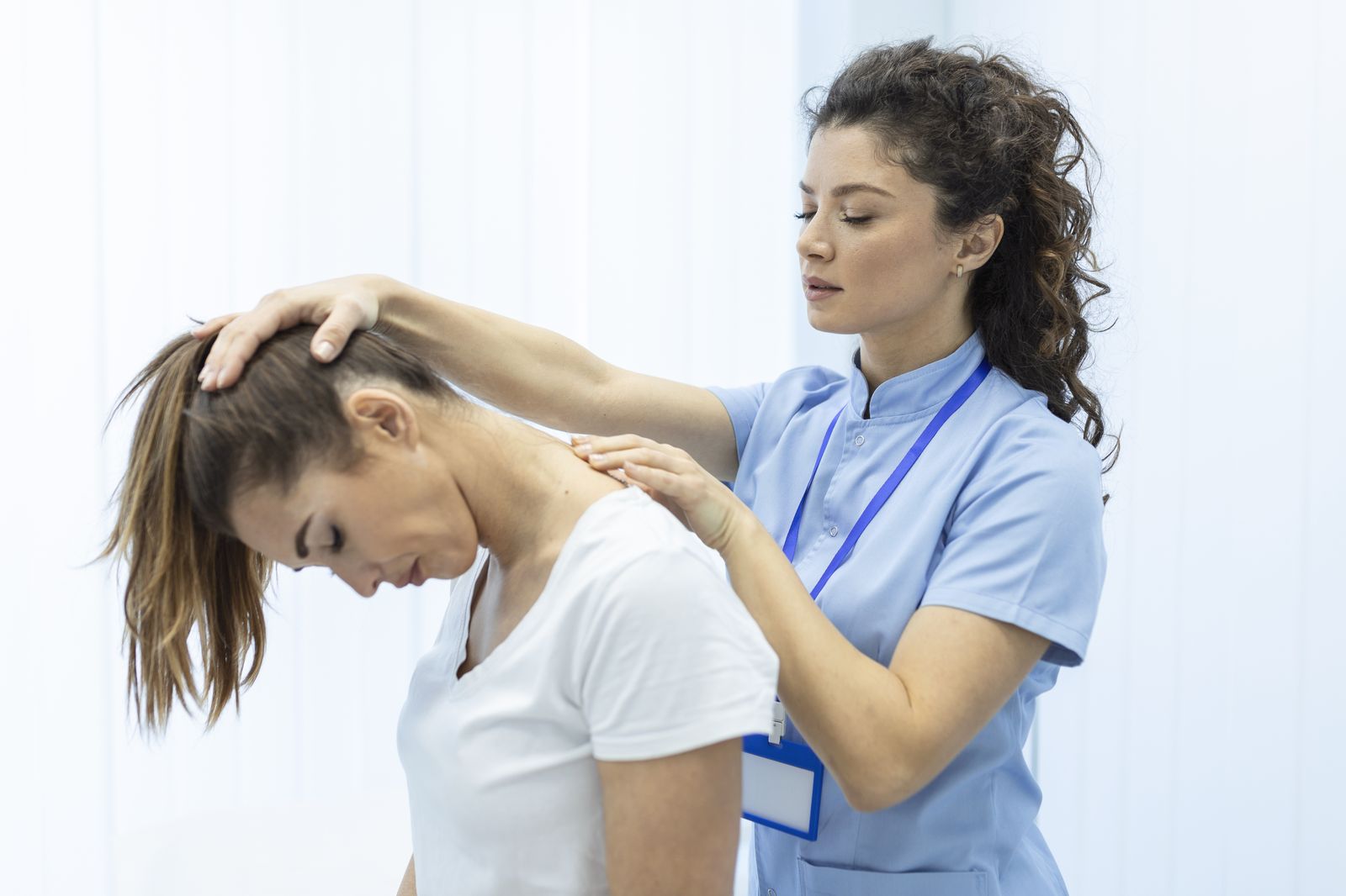 Chiropractor treating a patient in a California clinic